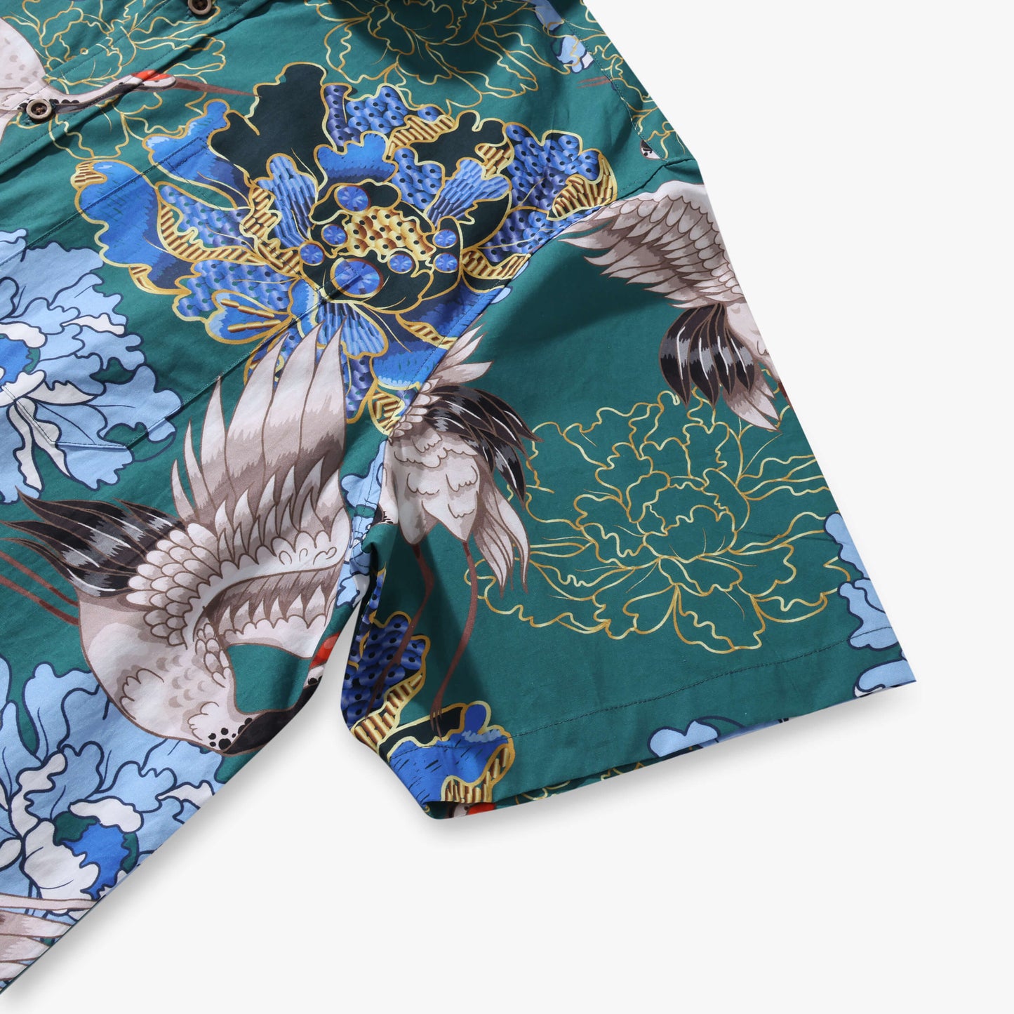 Crane Perched on Blue Peonies