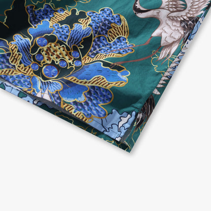 Crane Perched on Blue Peonies